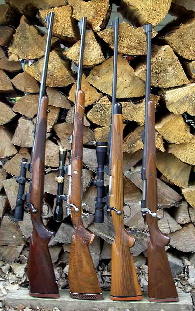 Many classic and modern wood stock rifles feature full-length barrel bedding. Examples include a (left to right): Winchester pre-’64 Model 70 .375 H&H Magnum, Browning FN High Power Olympian Grade .338 Winchester Magnum, Kimber of Oregon BGR 89 .300 Winchester Magnum and a Ruger M77 Hawkeye .375 Ruger.